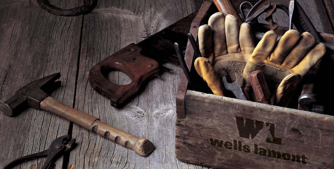 Wells Lamont New Zealand, stubborn about quality – image of old trusty gloves in a wooden toolbox